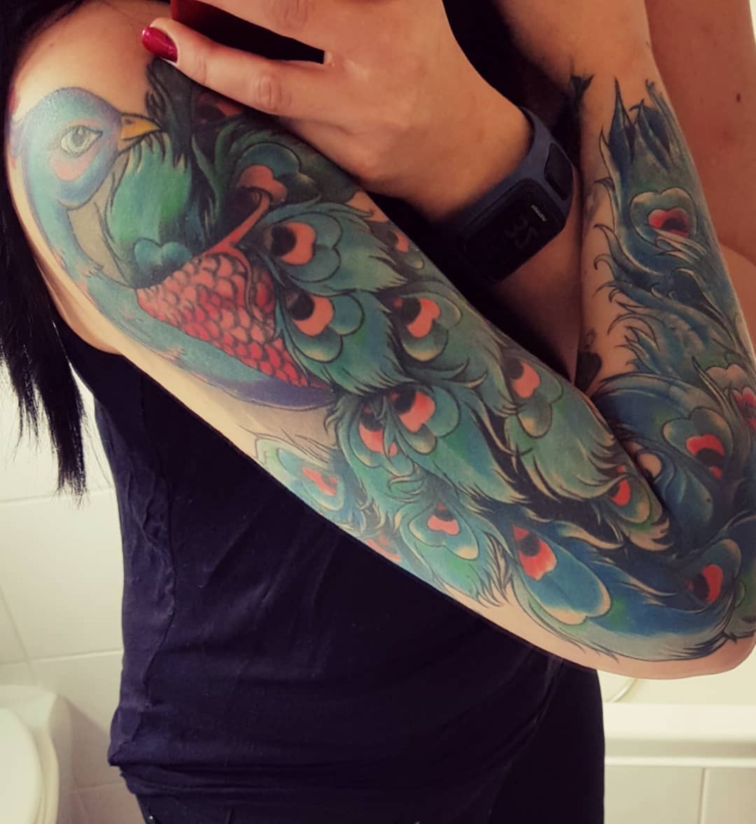 Beautiful Big Peacock Full Sleeve Tattoo Design
