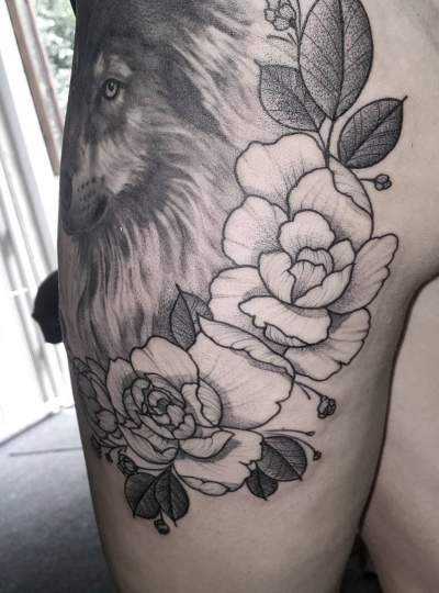 Black Lion Tattoo With Flowers