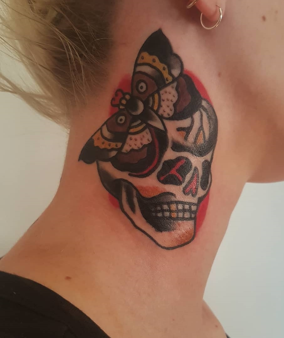 Bold Skull With Butterfly Inked On Side Neck