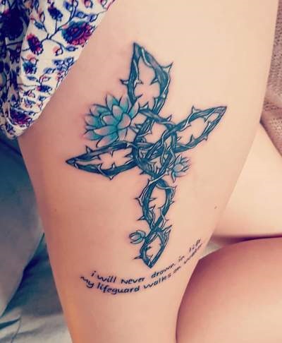 Charismatic Colorful Thigh Tattoo With Quote