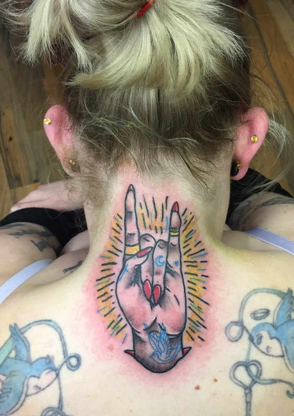 Charismatic Hand Tattoo On Neck