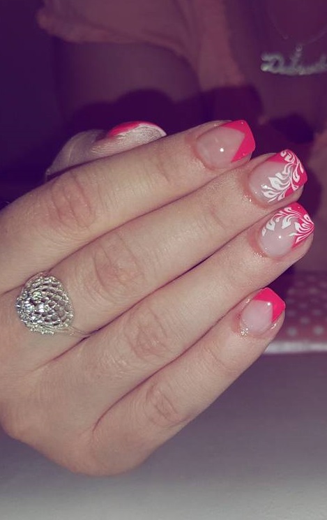 Classic Pink French Nail Art With Floral Design