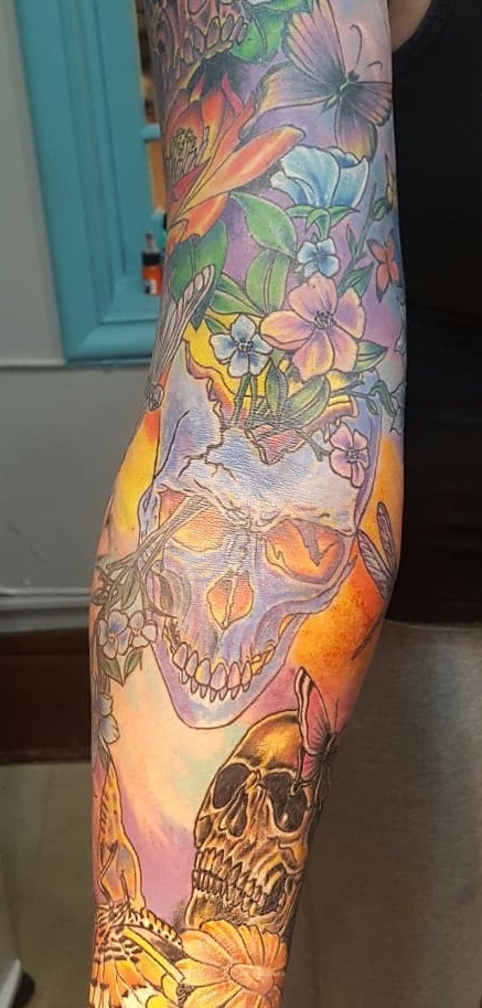 Colorful Skull, Flower And Butterfly Inked On Sleeve
