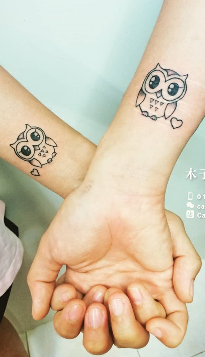 Dashing Owl Tattoo On Wrist