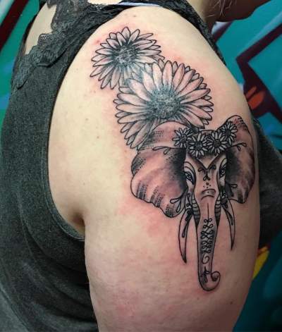 Elephant With Sunflower On Shoulder