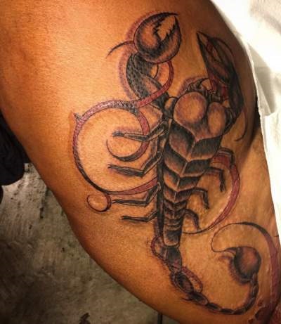 Exquisite Scorpion Thigh Tattoo For A Lady