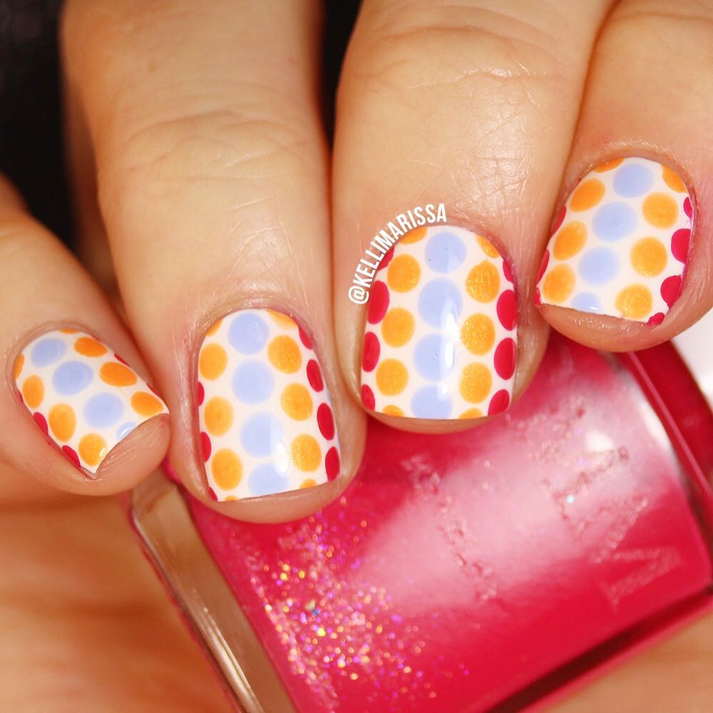 Few Nails Painted In Polka Dots To Get A Different Summer Look