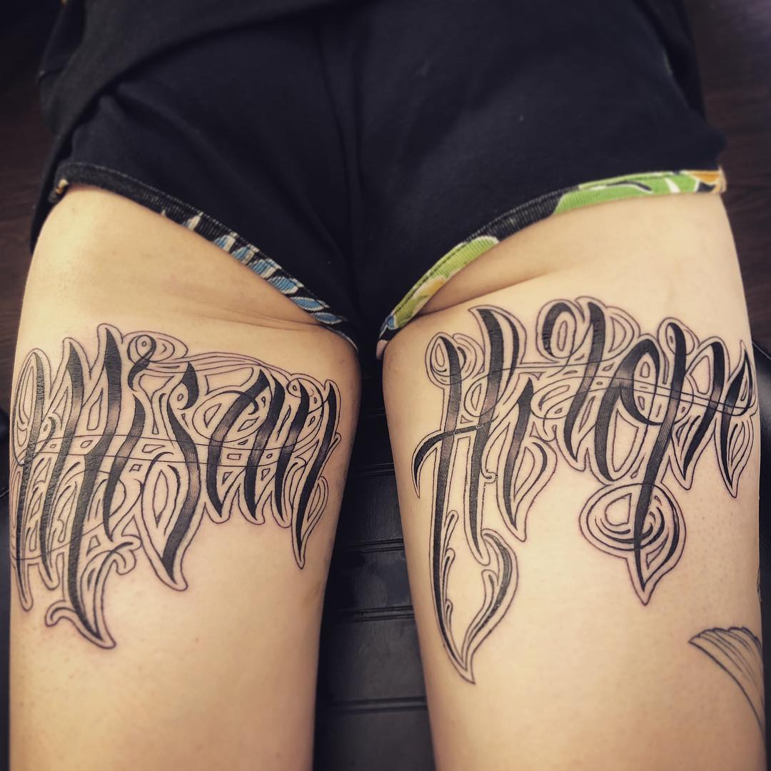 Freehand Script Tattoo On Thigh