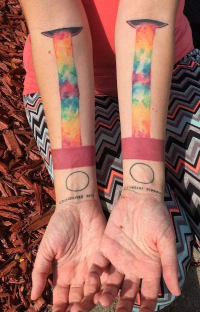 Fully Healed Watercolor Rainbow Arm Tattoo