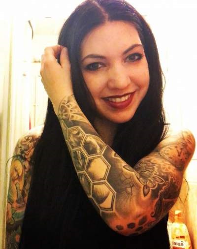 Girl With Full Sleeve Tattoo