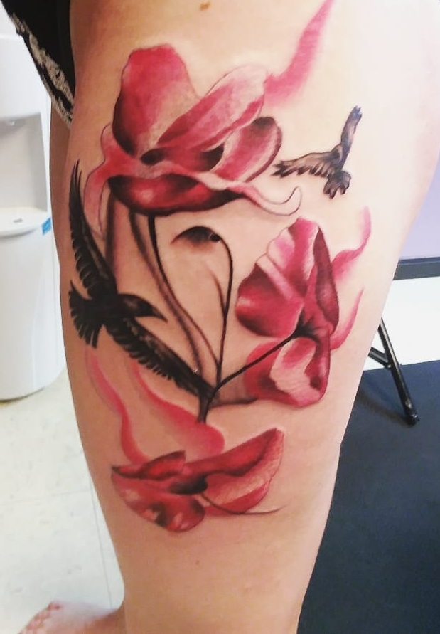 Glamorous Watercolor Tattoo Of Birds With Flower On Thigh