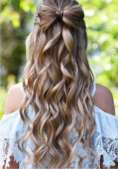 Lavish Curly Hairs With Bow