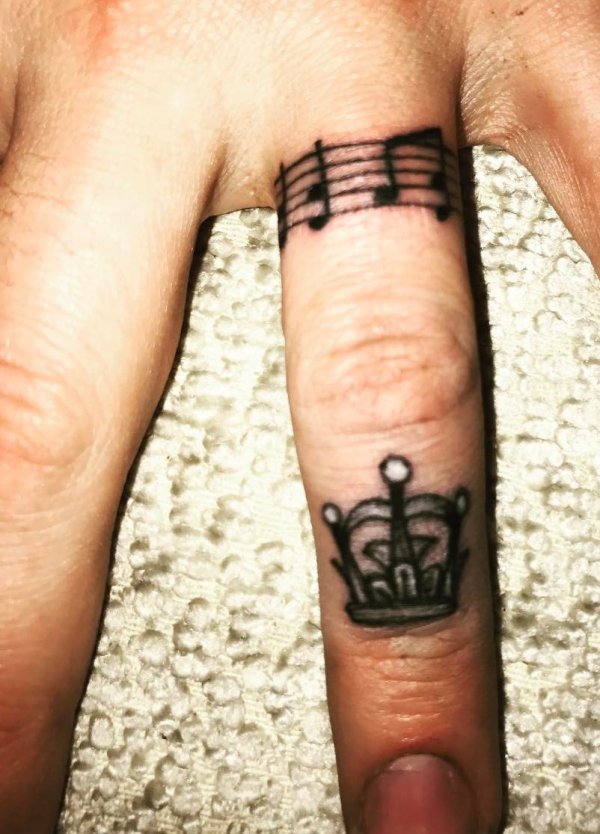 Music Notes With Crown On Ring Finger