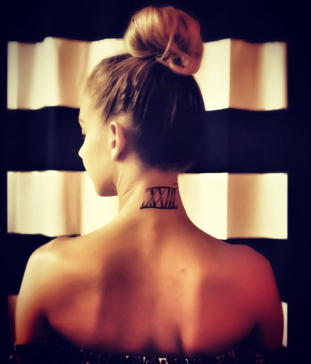 Roman Numerals Tattoo Idea To Keep Some Dates Or Figures Permanent On the Neck