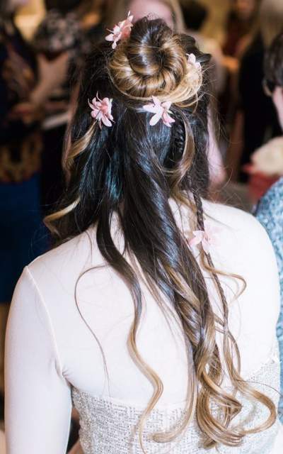 Romantic Top Knot With Loose Waves & Fresh Flowers For Summer Party
