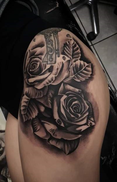 Roses With Leaves Tattoo For Thigh