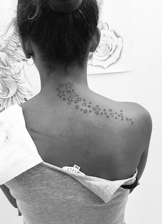 Stars Trails Down Tattoo Design Starting From Neck To Back