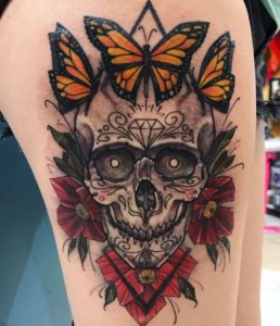 Sugar Skull Thigh Tattoo With Butterfly And Flowers