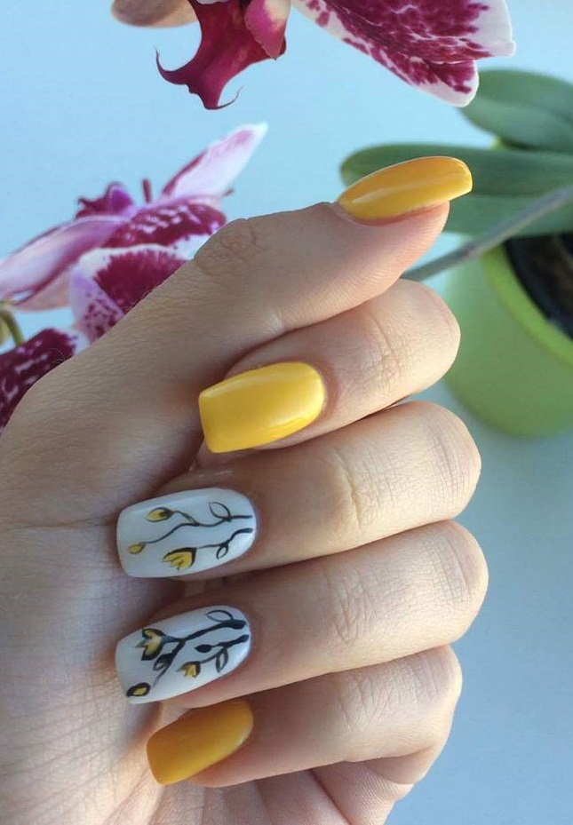 Tulip On White And Yellow Nails