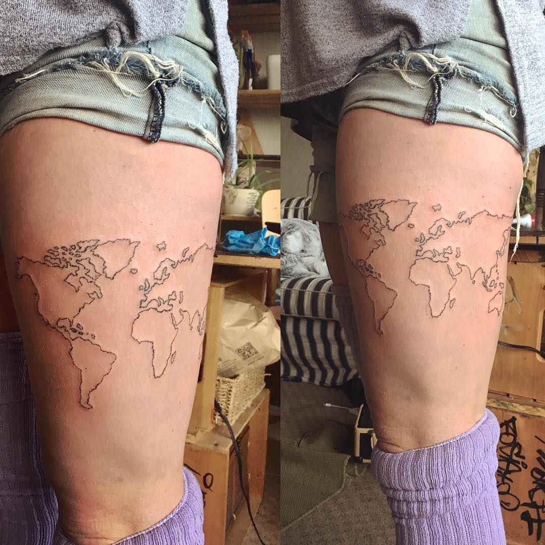 Whole World Tattooed On Thigh