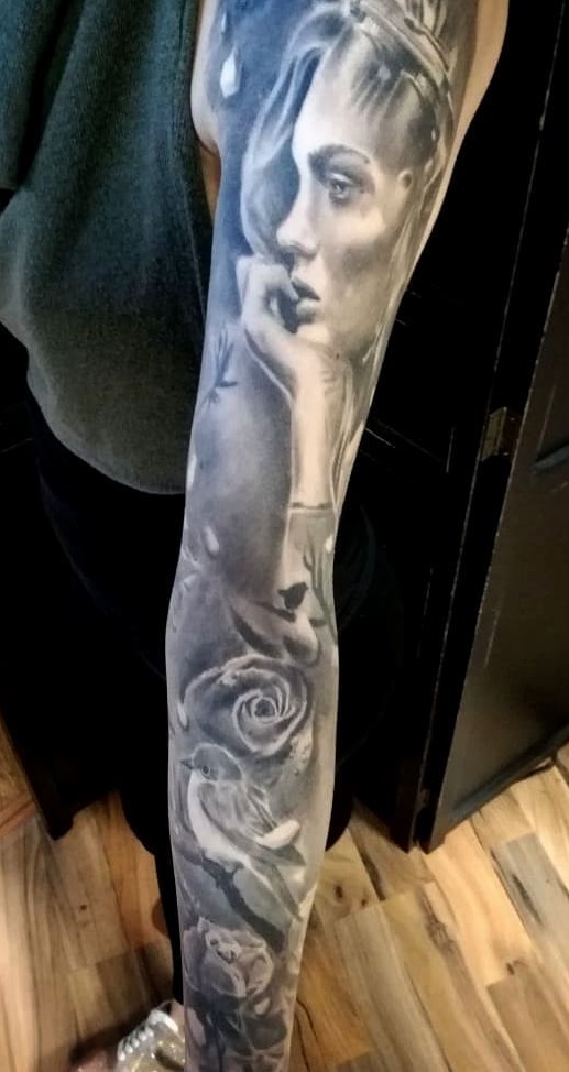 Wonderful Black & Gray Full Sleeve Tattoo Of Women, Bird And Flower