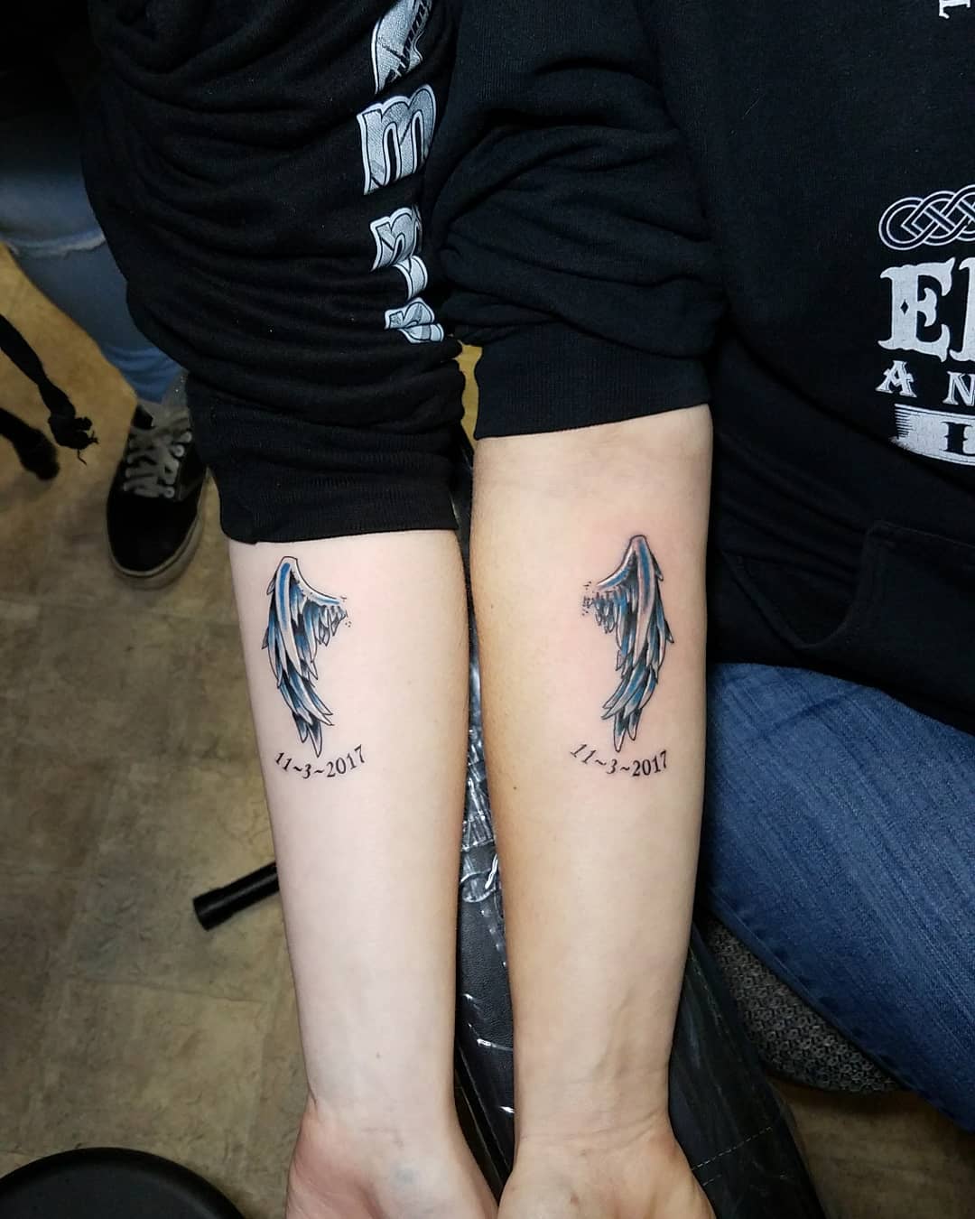 Black And Blue Wings Tattoo For Mother And Daughter