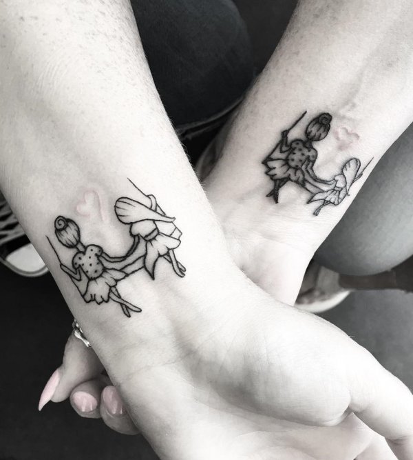 Dashing Fineline Matching Tattoo For Mother And Daughter