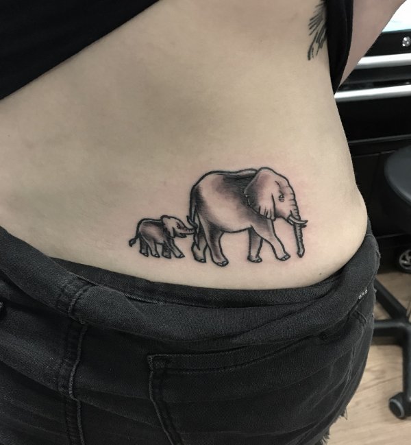 Elephants Inked On Lower Back
