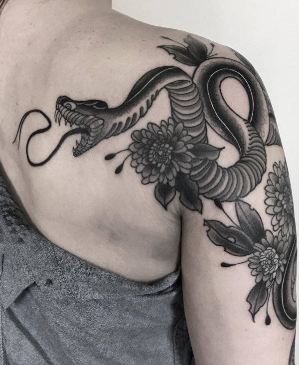 Fabulous Black Work Snake Tattoo With Flowers On Shoulder