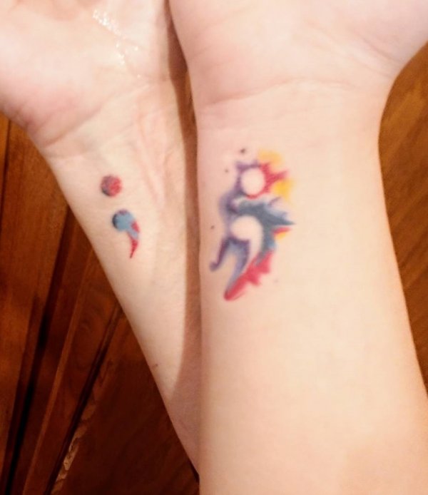 Incredible Watercolor Mother Daughter Wrist Tattoo Idea