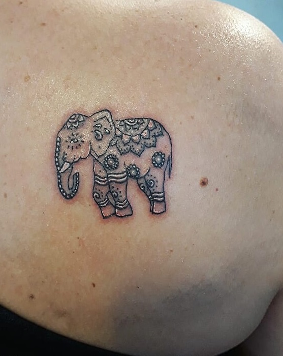 Small Elephant On Shoulder