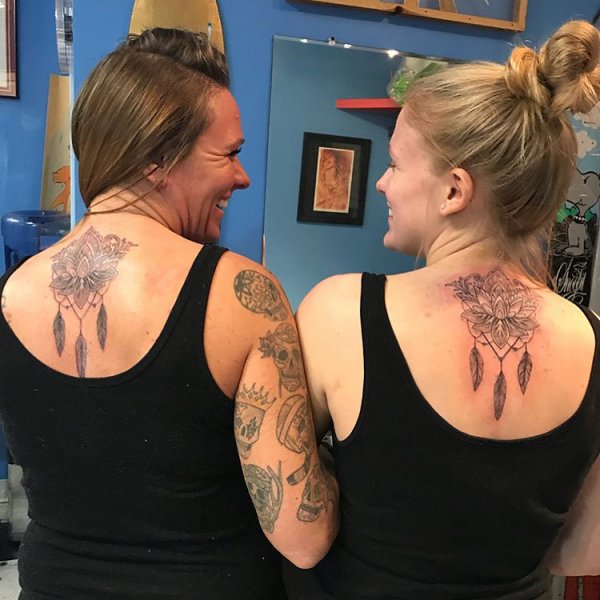 Spectacular Matching Tattoos On Neck