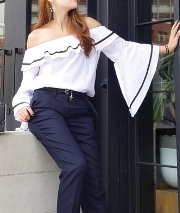 White Off Shoulder Blouse And Navy Blue Trouser