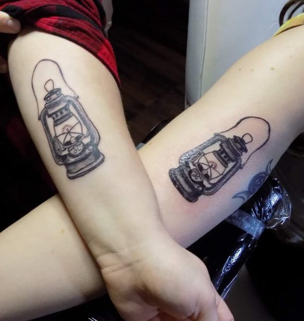 Alluring Matching Lantern Sister Tattoo On Arms