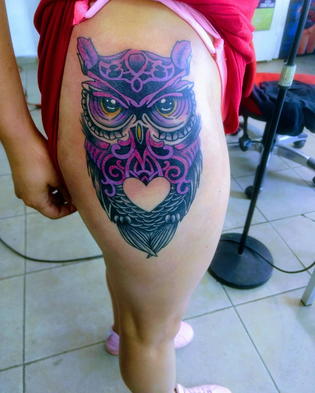 Amazing Colorful Owl With Beautiful Heart Tattoo On Thigh