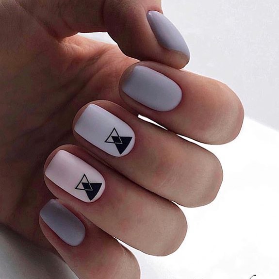 Artistic white and gray geometric nails