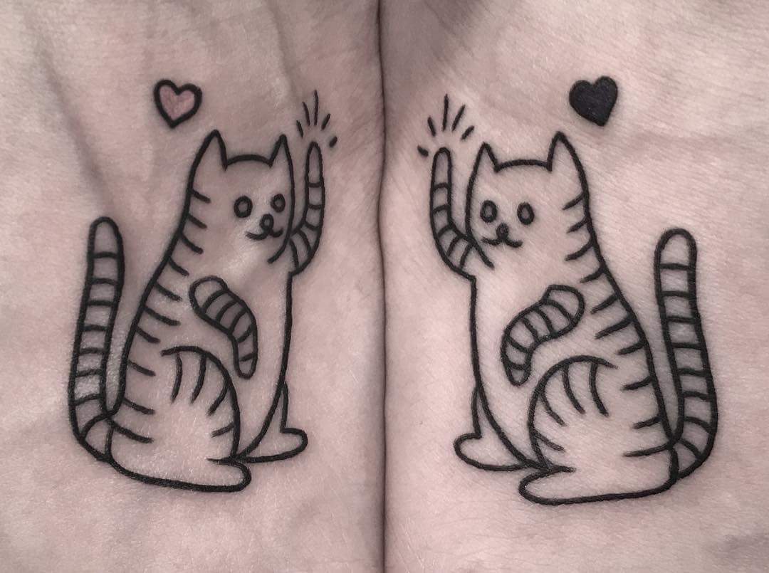 Bold Linework Cat And Heart Matching Sister Tattoo