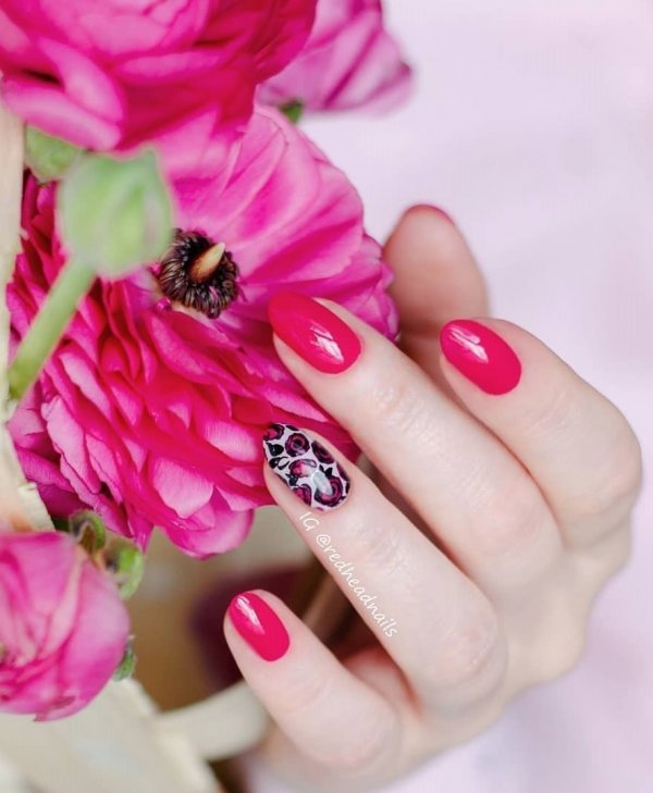 Bright Pink Nails With Flowers To Complete The Look