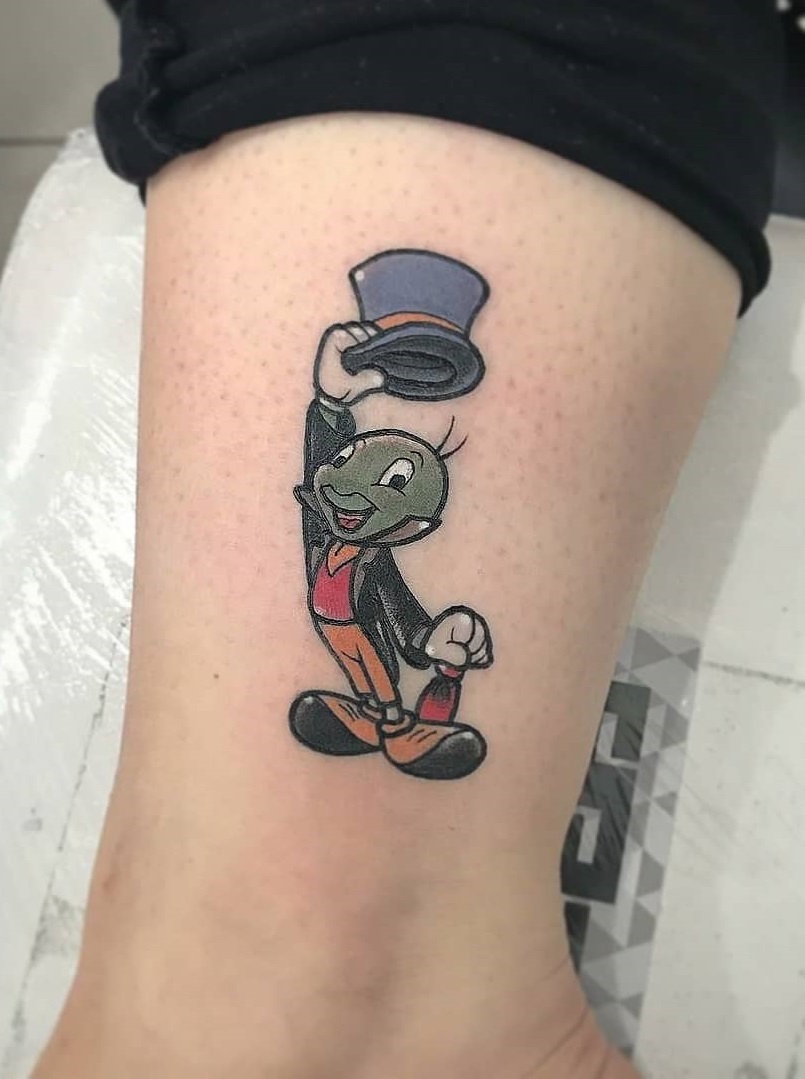Cartoon Character Tattoo On Lower Leg