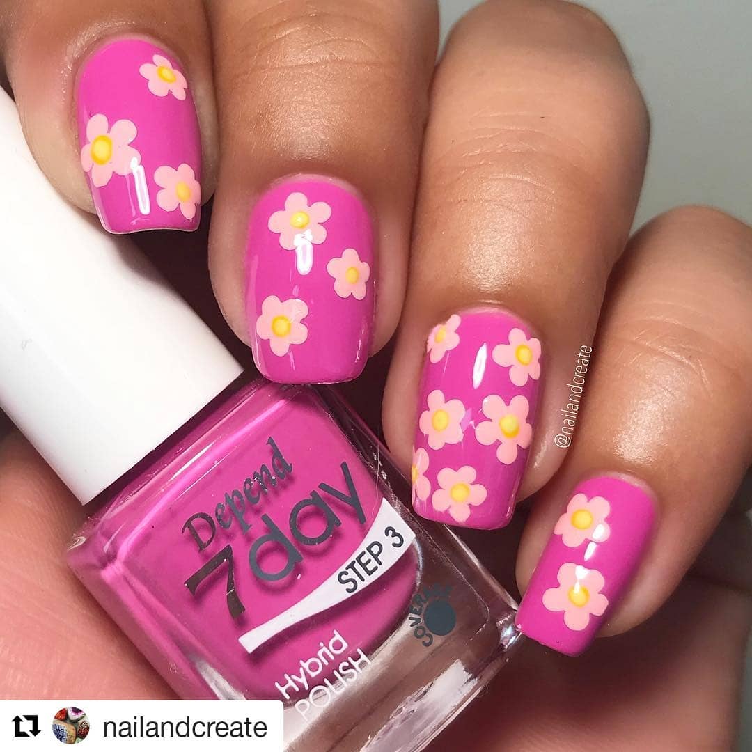 Chic Bright Pink Nails With White Flowers