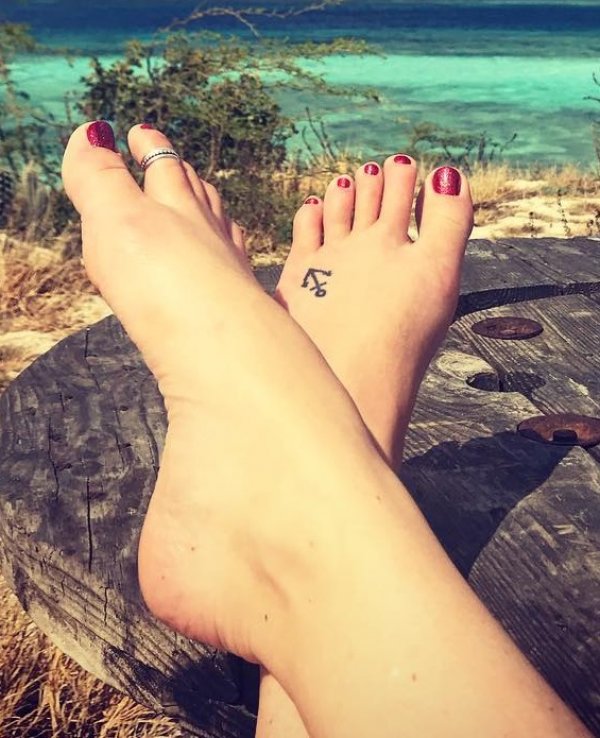 Cool small anchor tattoo on foot
