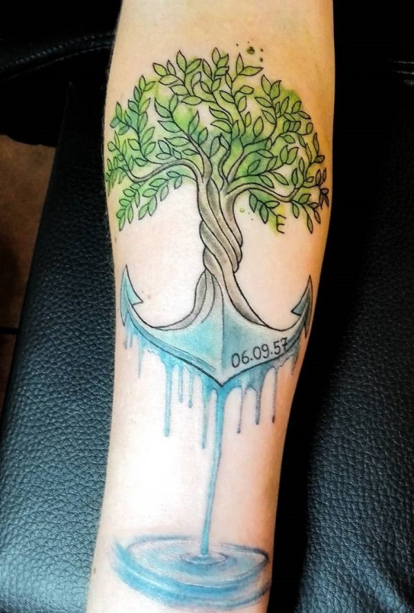 Fantastic watercolor family tree anchor tattoo on lower leg