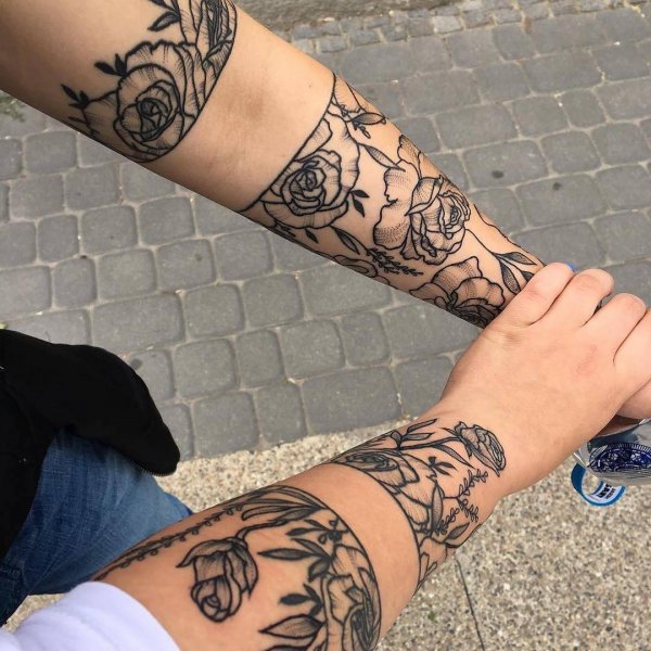 Graceful Black Linework Coverup Matching Arm Tattoo For Sisters