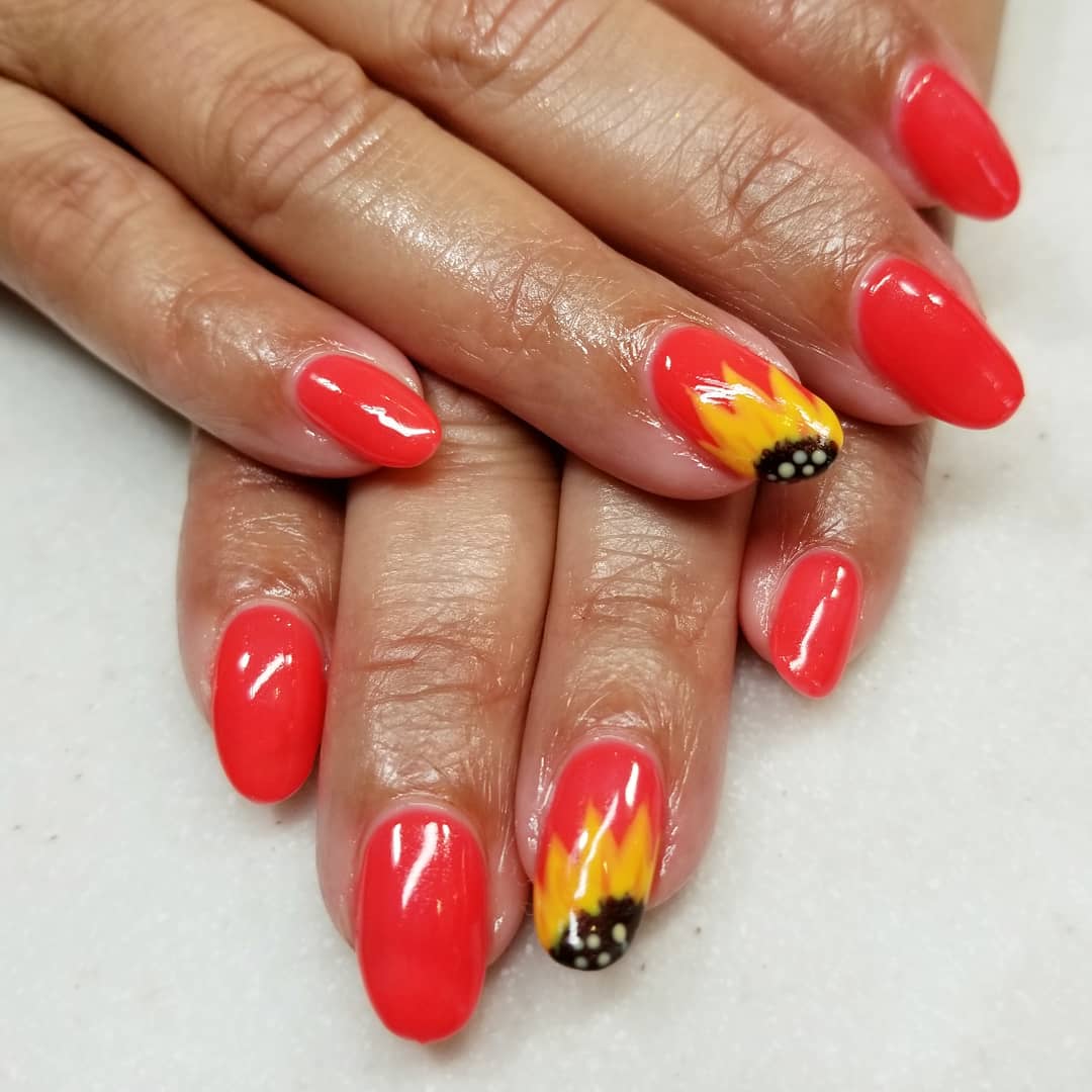 Impressive Coral Nails With Sunflower