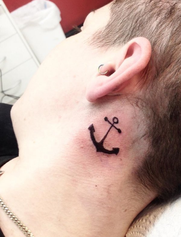 Impressive anchor hairline tattoo idea