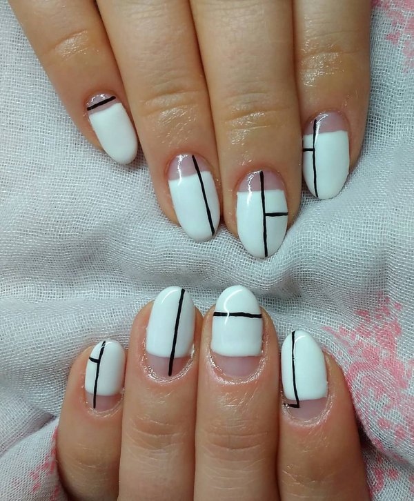Impressive white negative space geometric nails