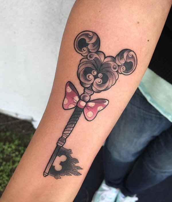 Magic Disney Wand With A Bow Tattoo For Arm