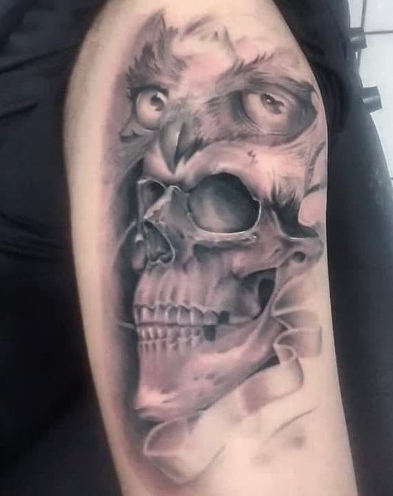 Marvelous Black And Gray Skull Tattoo With Owl