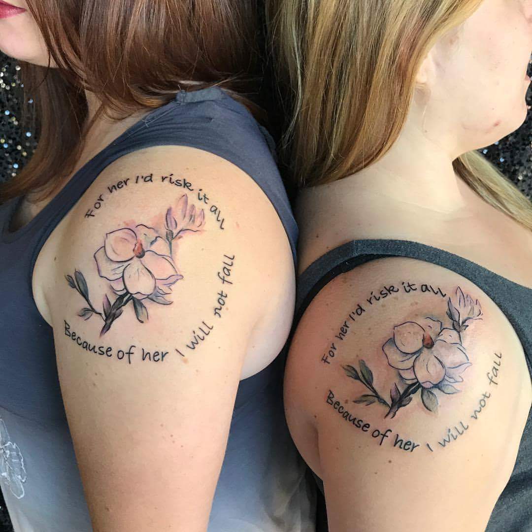 Matching Sister Tattoo With Flower And Quote On Shoulder