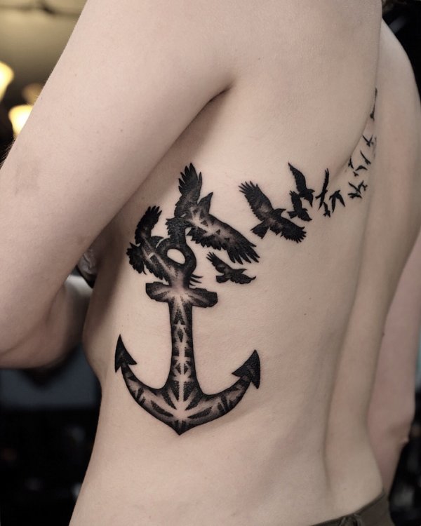 Mind-blowing black anchor and birds tattoos on back